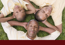 Three generations of men together on a lawn - click for "Estate Planning: Wills & Trusts"